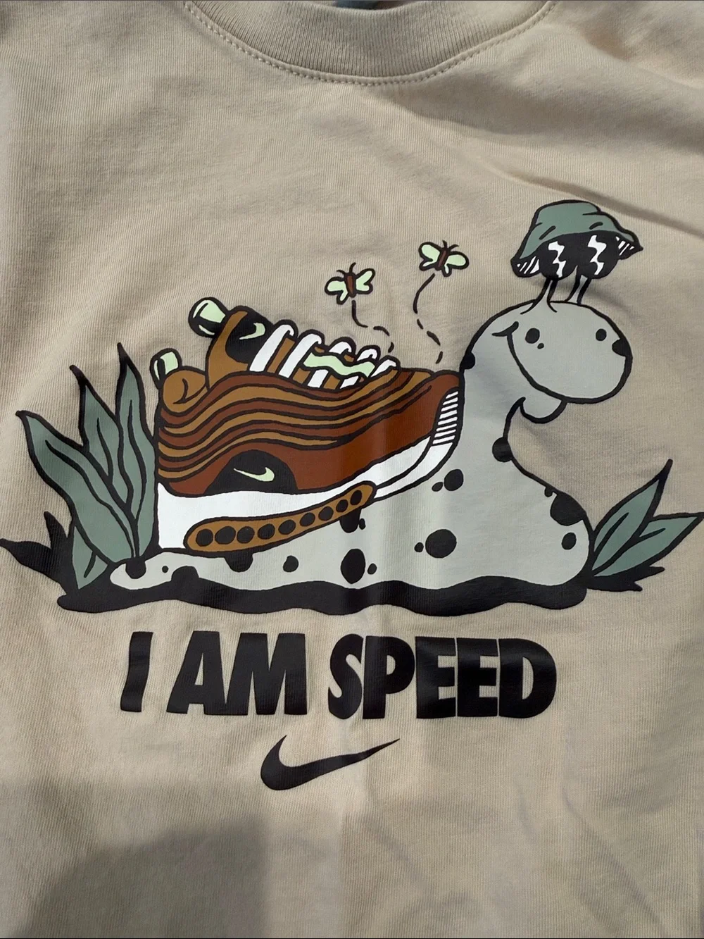 Nike Beige Graphic Tee with Brown & Green Print